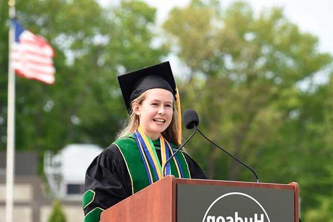 Grace Harrison speaking at commencement